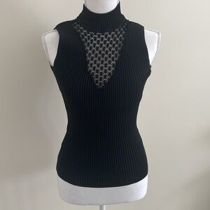 Bellini Very Stretchy black top with see through panel. Medium